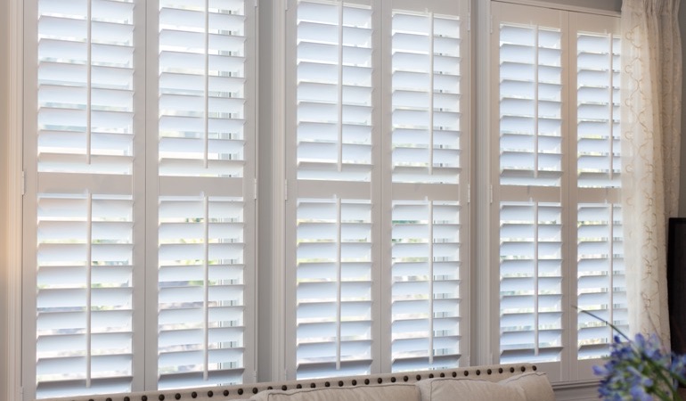 Faux wood plantation shutters in Austin